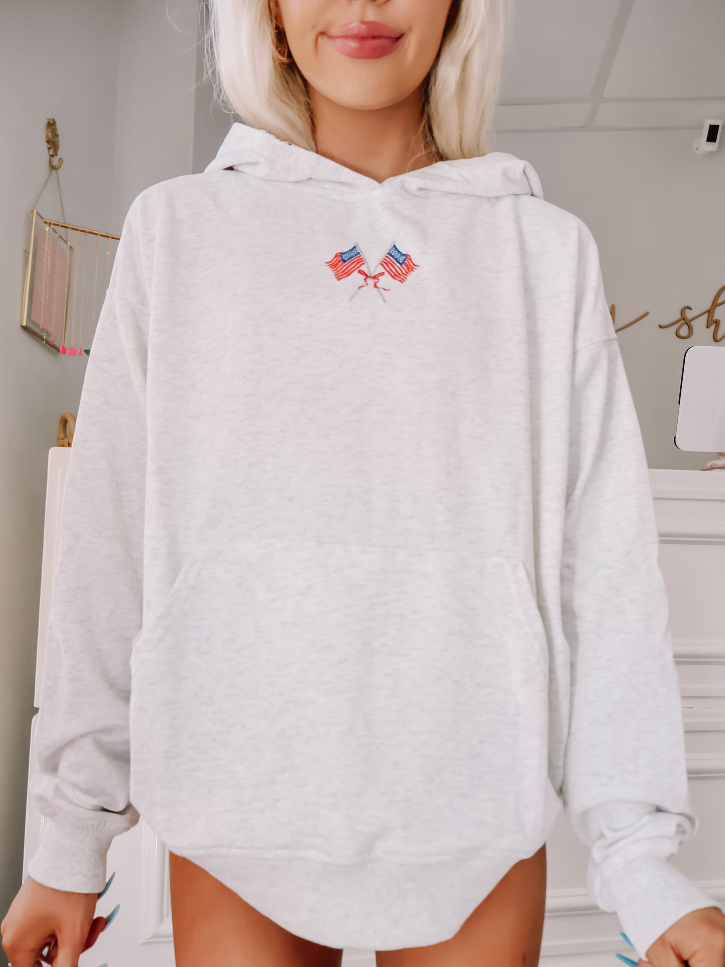 model wearing american dream hoodie from sassy shortcake.