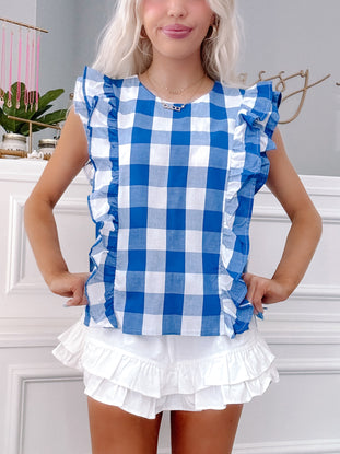 Front view of Back Porch Blues Top styled with denim skirt for a summer picnic.