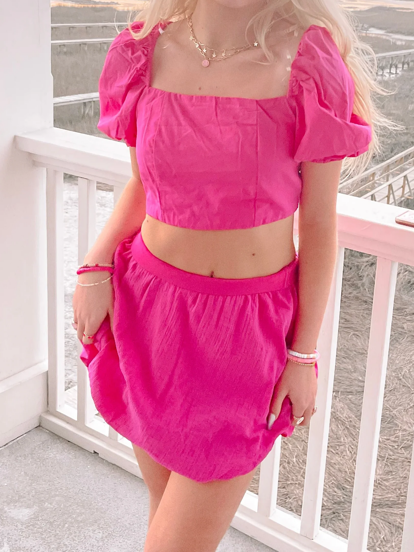 Bubble Babe hot pink mini skirt and puff sleeve crop top set