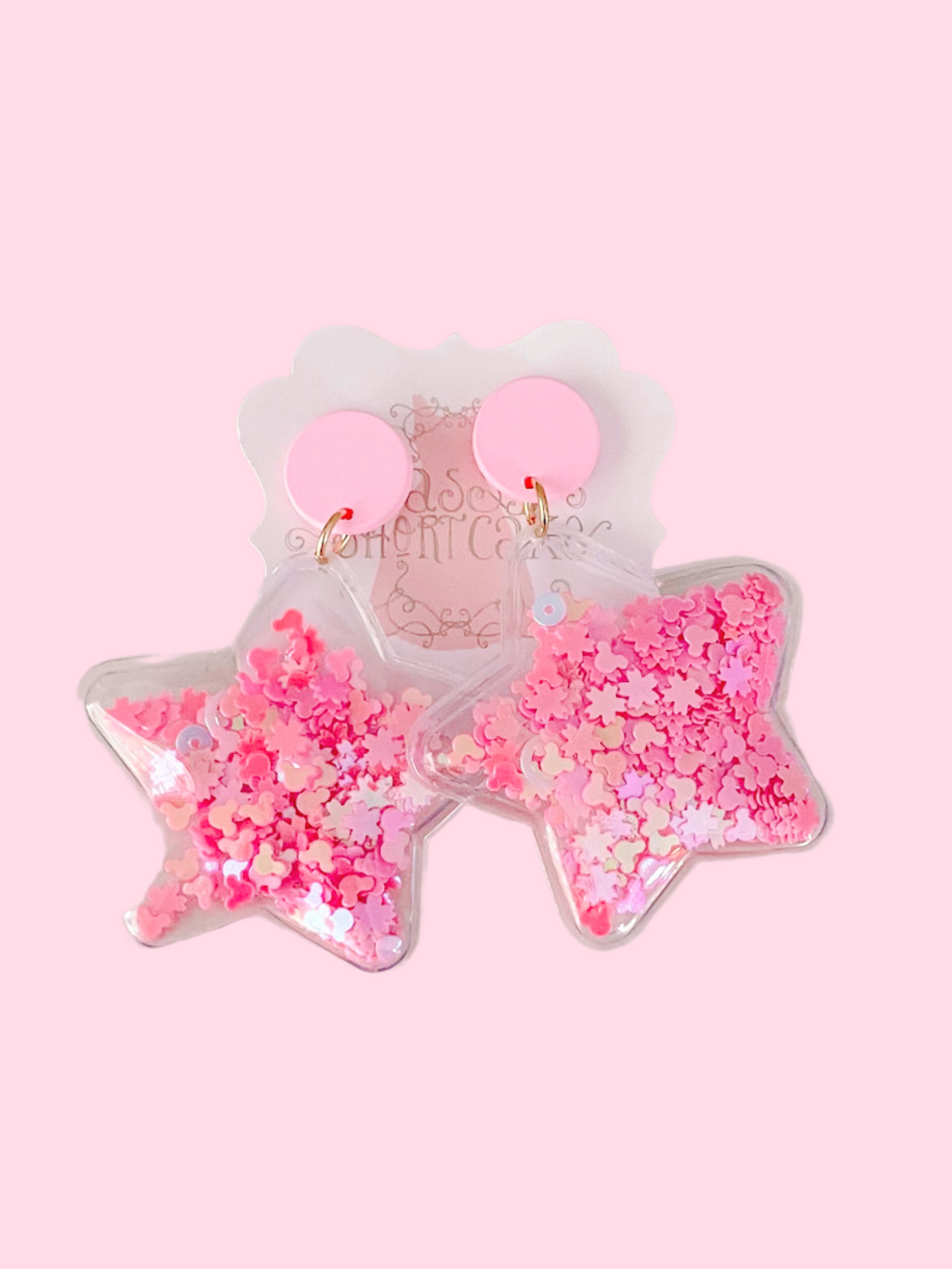Light pink Star Jelly earrings with pink glitter inside star-shaped resin.