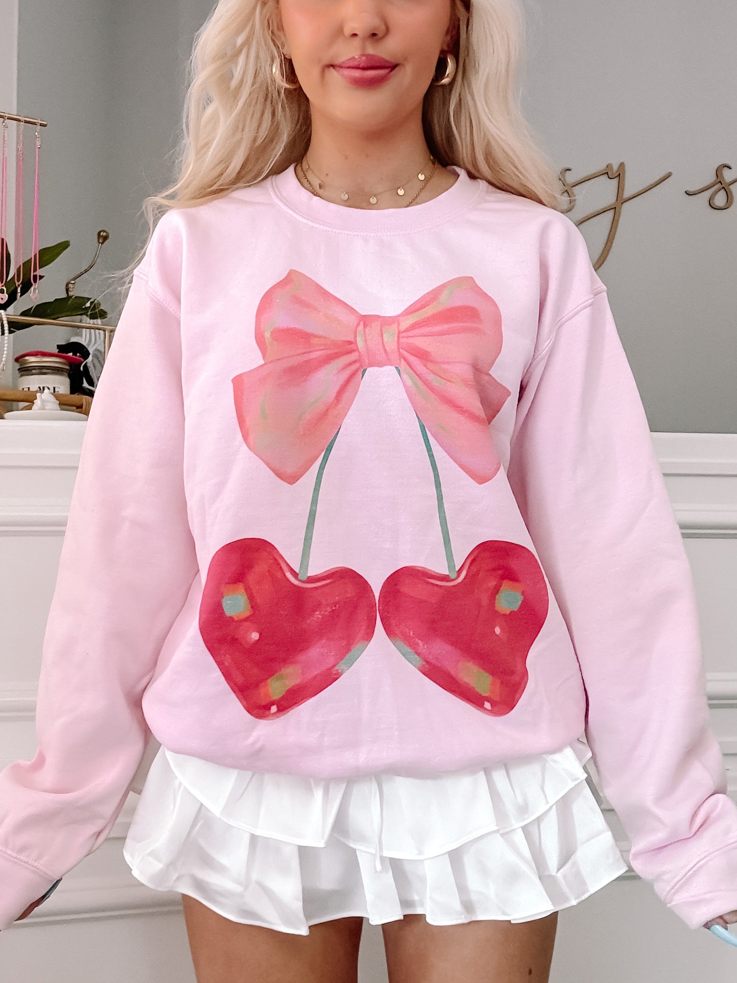 Pink Cherry Bow Crewneck sweatshirt featuring a cute cherry and bow design.