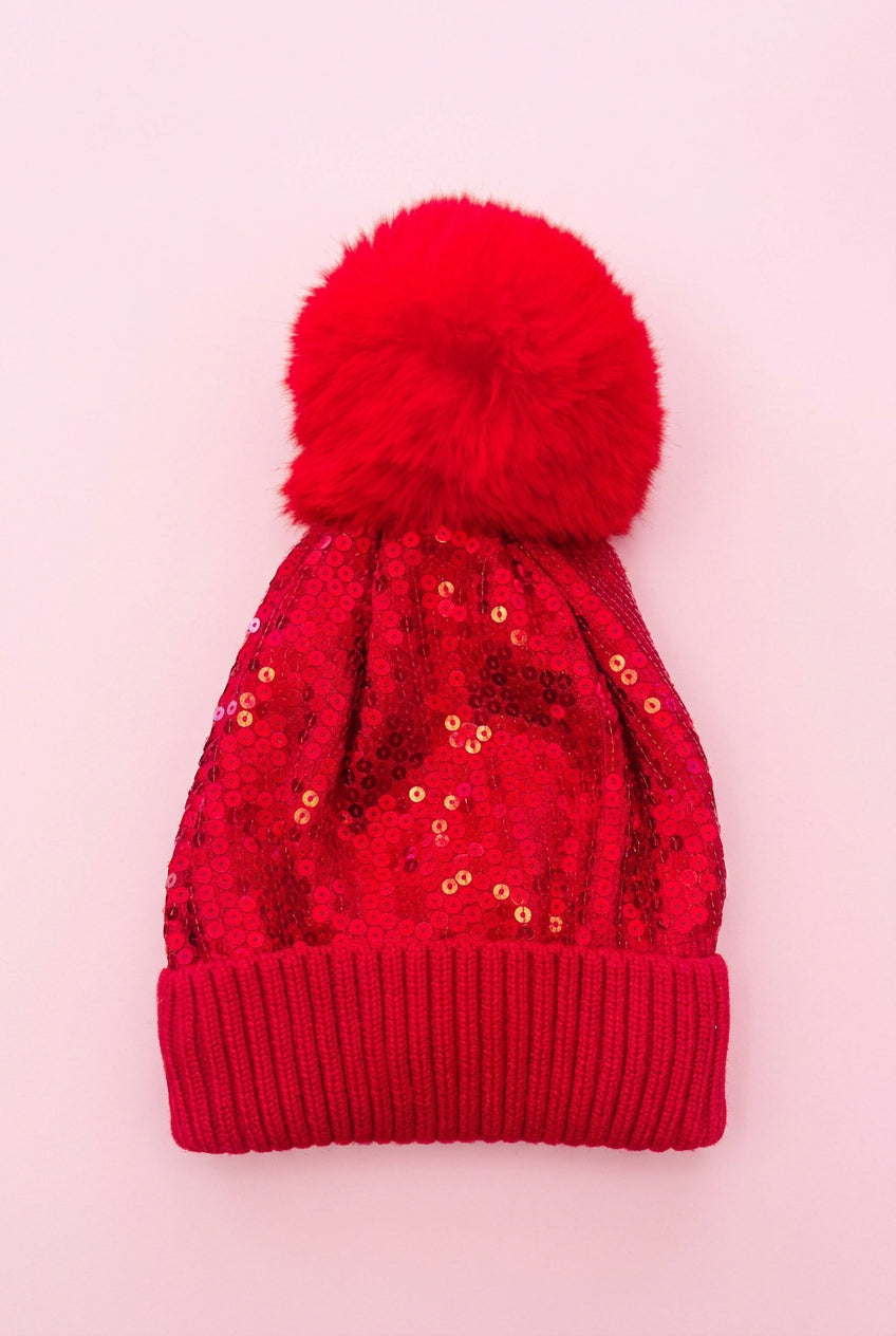 Red sequin beanie with faux fur pompom from sassy shortcake