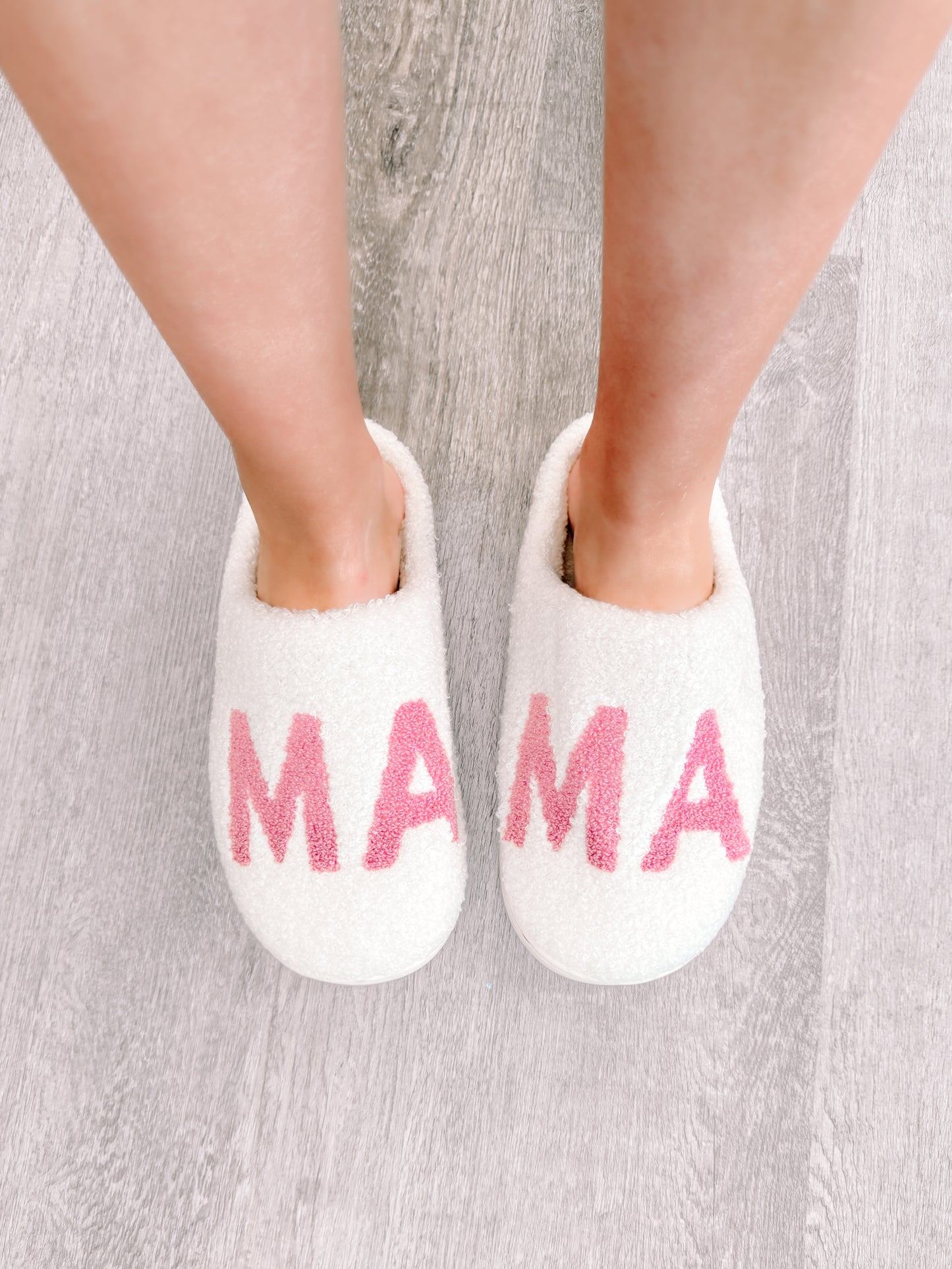 White Mama slippers with pink lettering for ultimate comfort.