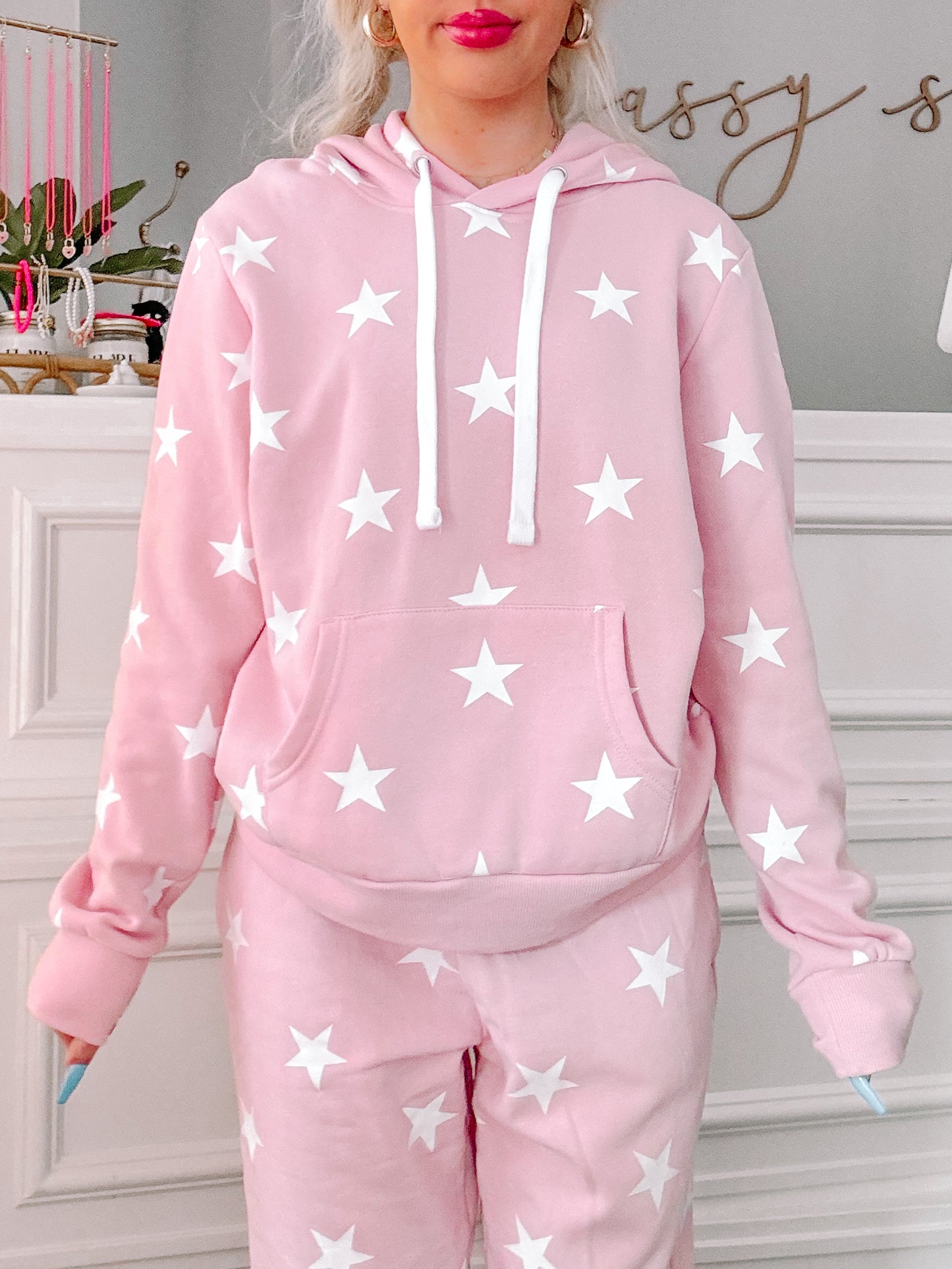 Pink Stargazer hoodie with white star print, cozy fleece fabric