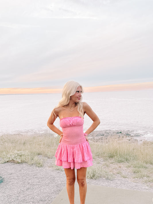 Pink Ocean View Dress from Sassy Shortcake: Pink tiered mini dress, worn outdoors by the ocean at sunset.