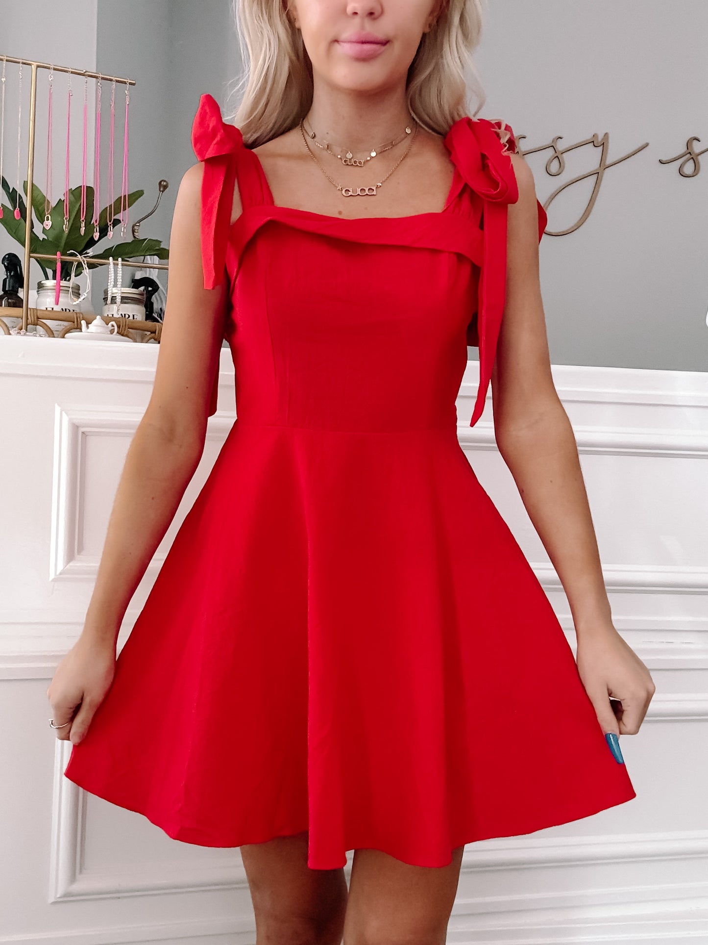 Red Girls Who Twirl fit-and-flare dress with tie straps.