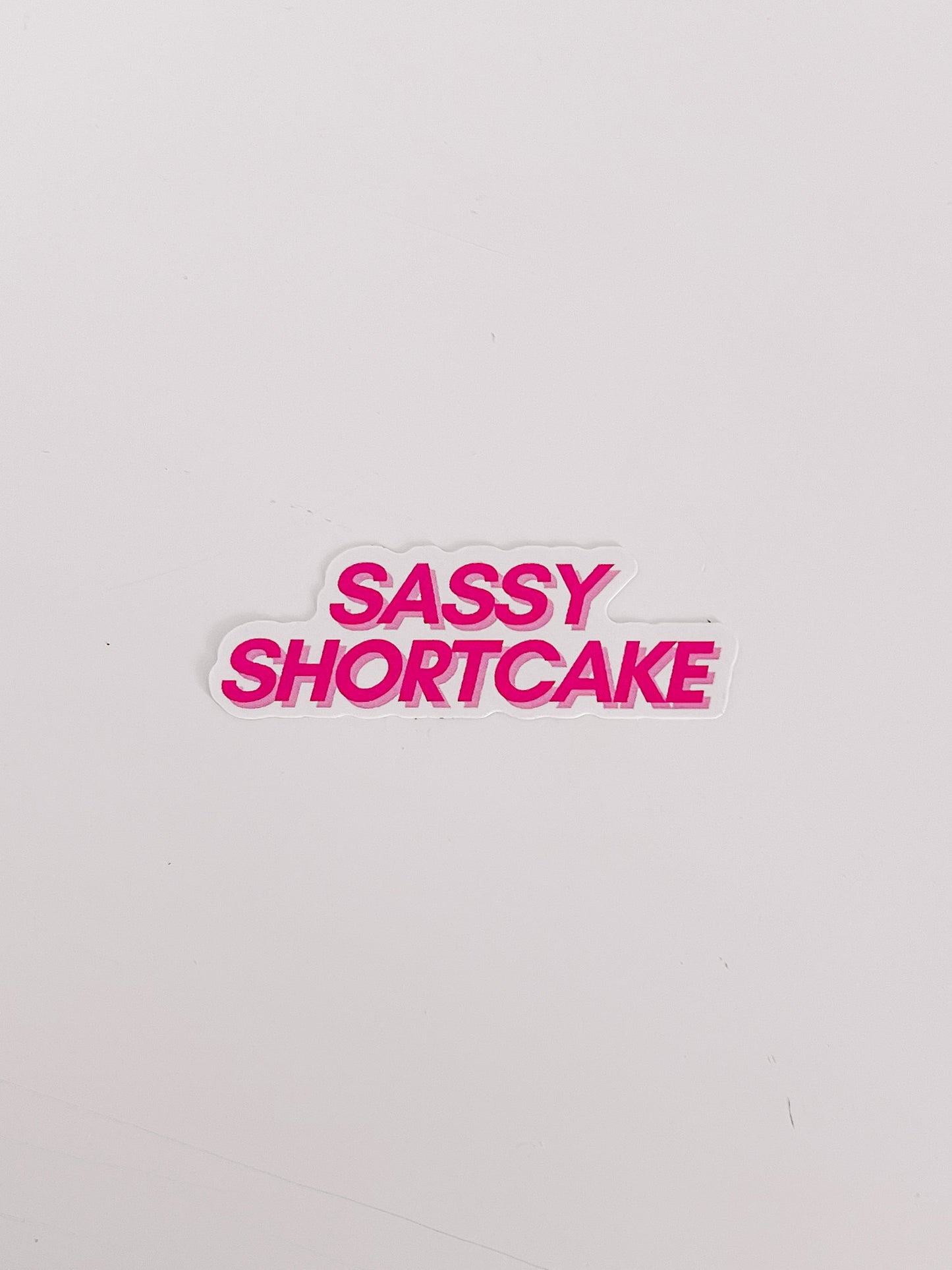 Pink "Sassy Shortcake" sticker on white background.