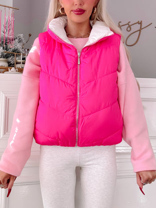 Turnabout Pink Puffer Vest: bright pink quilted puffer vest with white inner collar
