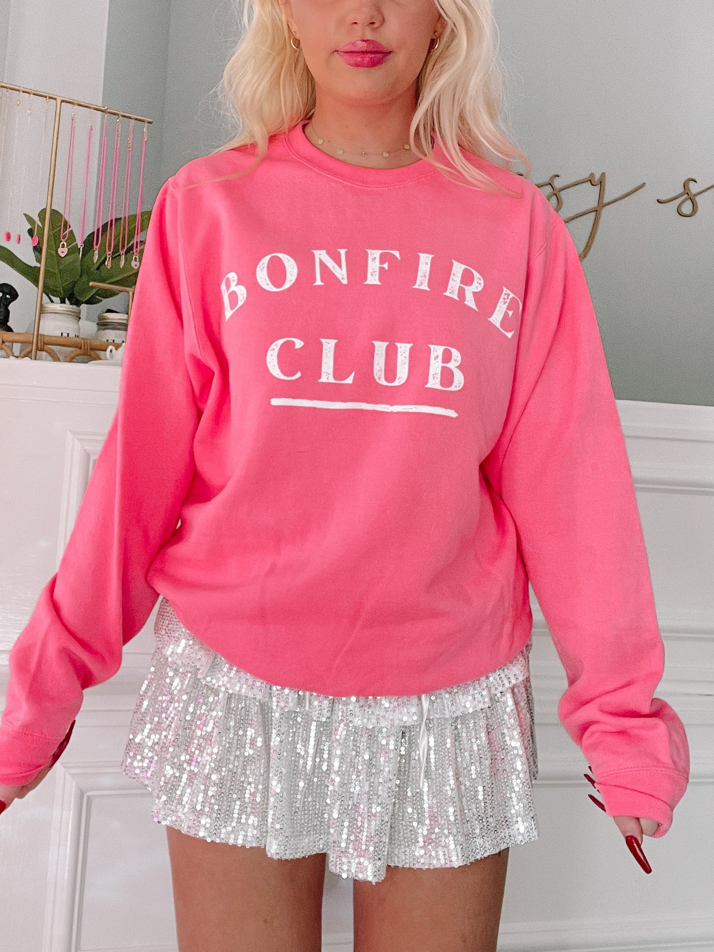 Pink Bonfire Club crewneck sweatshirt with white logo