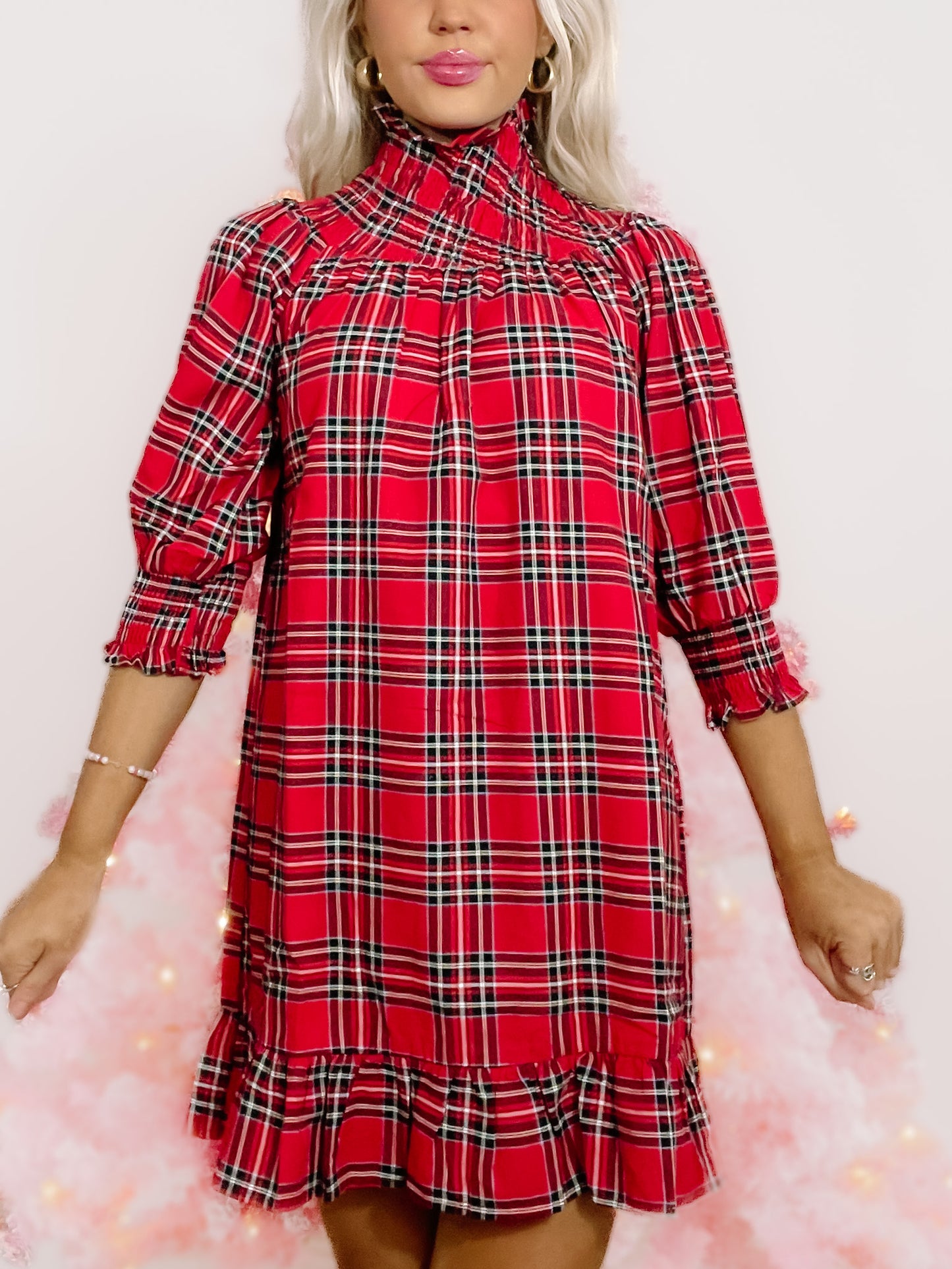 Red and black plaid party dress with mock neck and ruffle hem