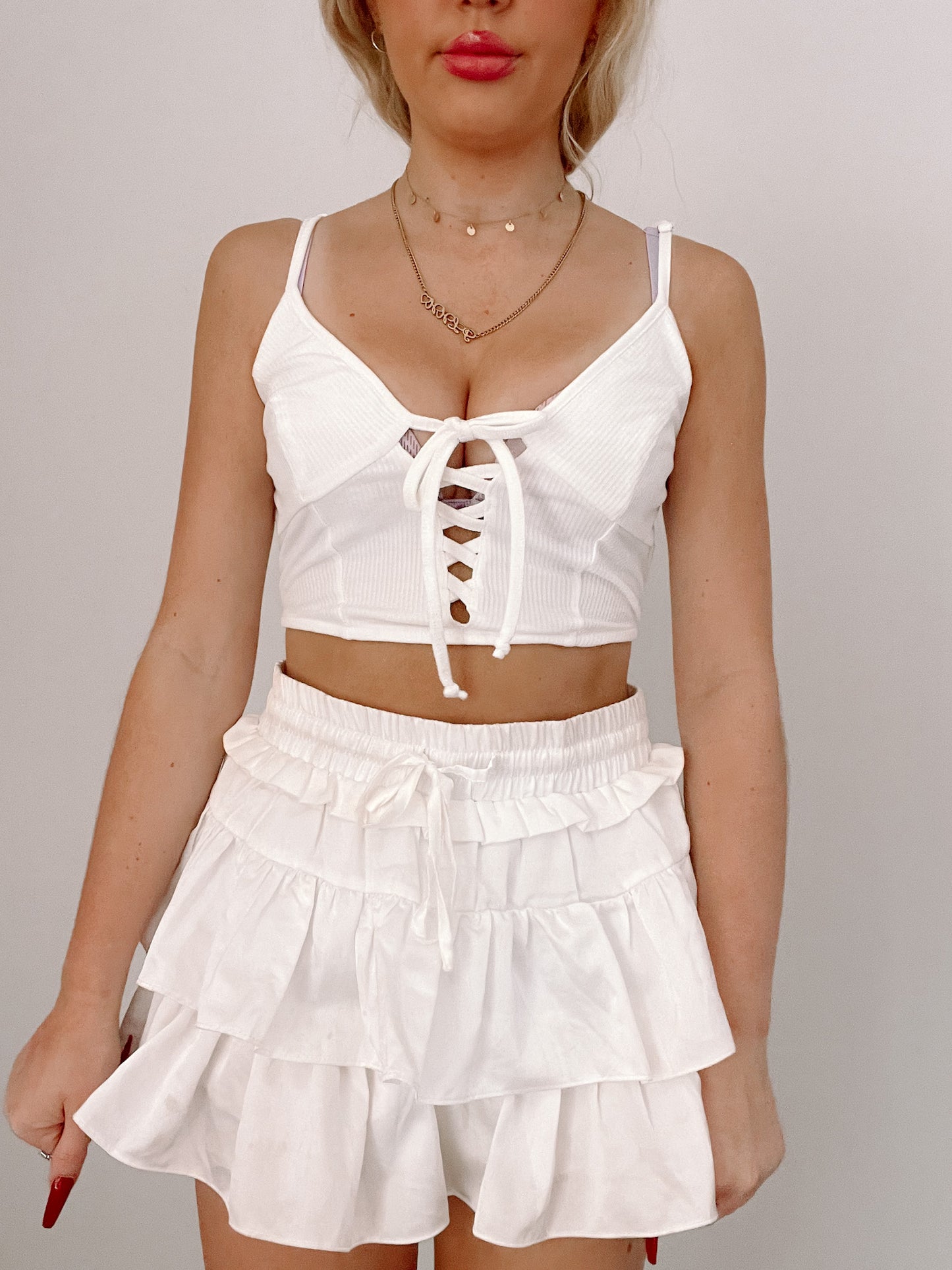 White ruffled mini skirt and lace-up crop top set, BFS Top #30
