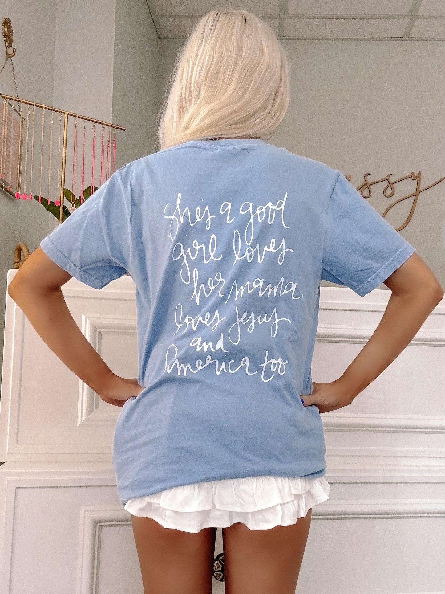 Oversized fit blue tee styled for casual summer holidays.