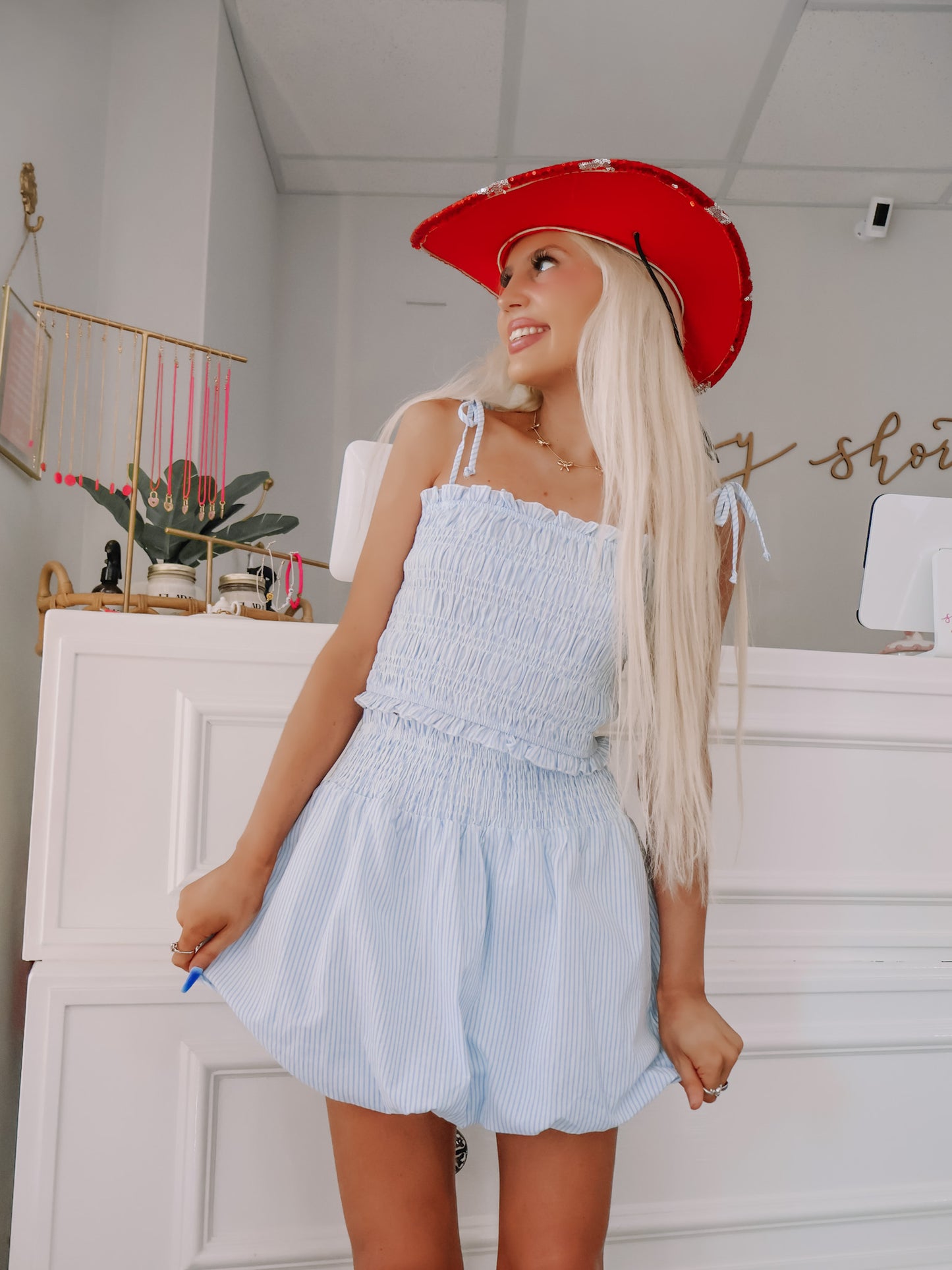 blue and white seersucker outfit set styled with a patriotic hat