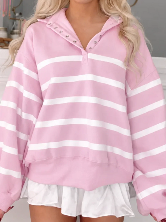 Front view of the Brynn Baby Pink Stripe Pullover, an oversized pink and white striped sweatshirt with a snap-button collar from Sassy Shortcake