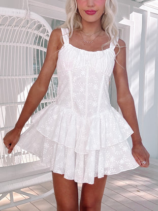 Front view of Ever After Eyelet Dress with flared double-layered skirt and feminine shape