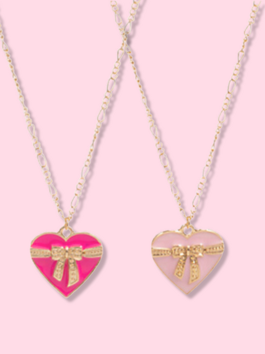 Gift of Love Necklace: Pink & blush heart pendant necklaces with gold bow accents, delicate gold chain from Sassy Shortcake