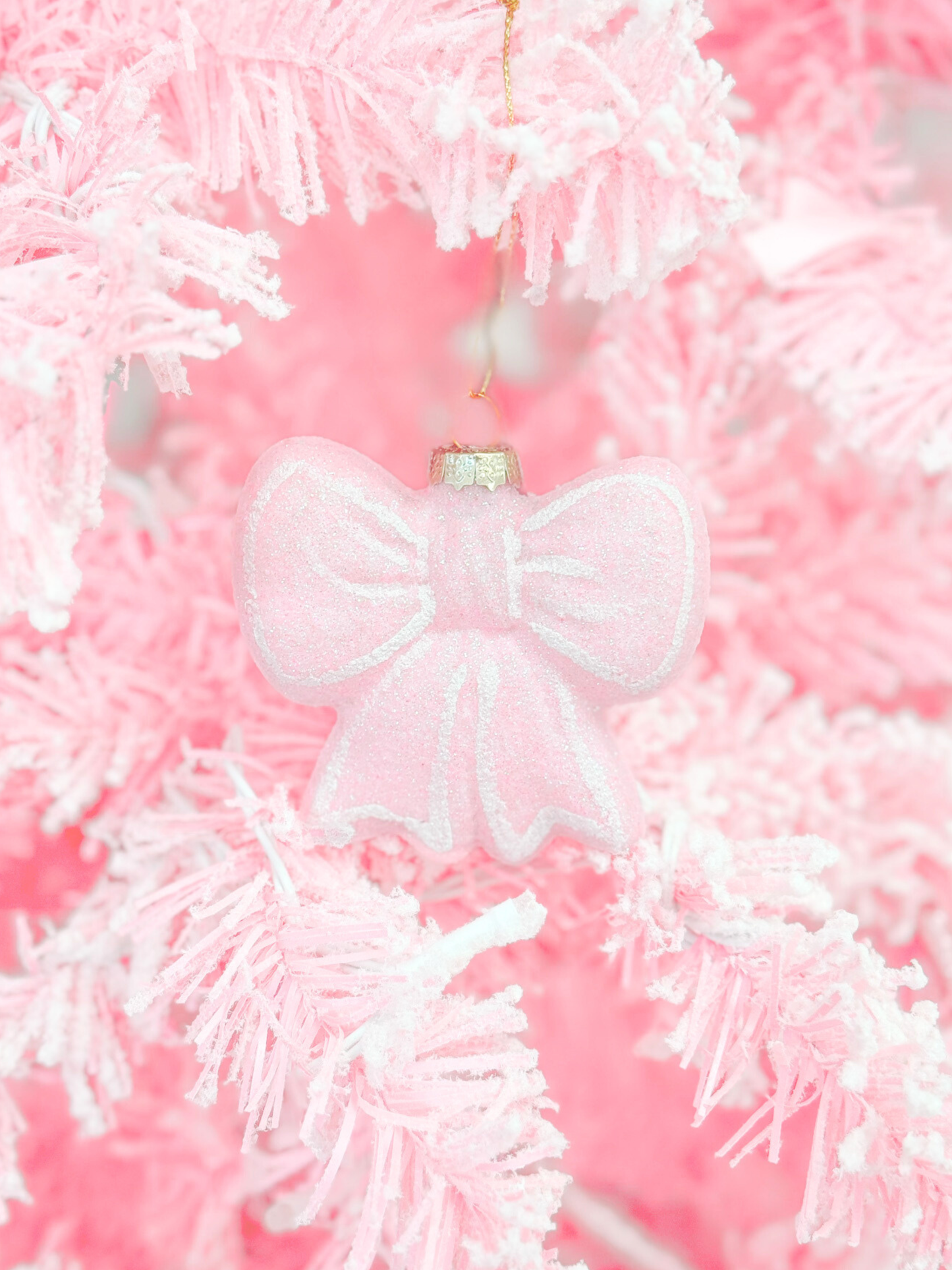 Sassy Shortcake pink glitter bow ornament, girly Christmas decor on a pink tree