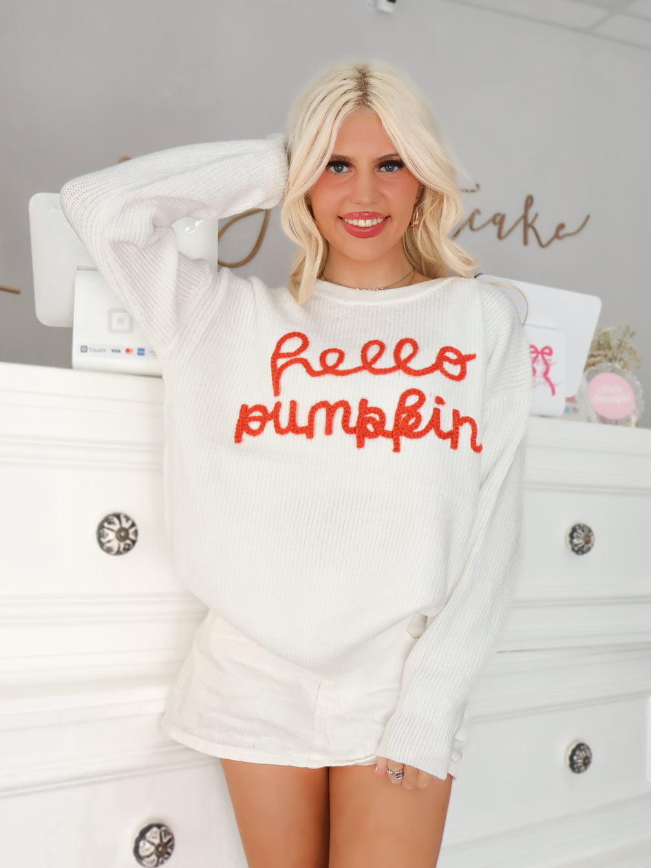 fall sweater with Hello Pumpkin written in orange on the front worn by model from Sassy Shortcake