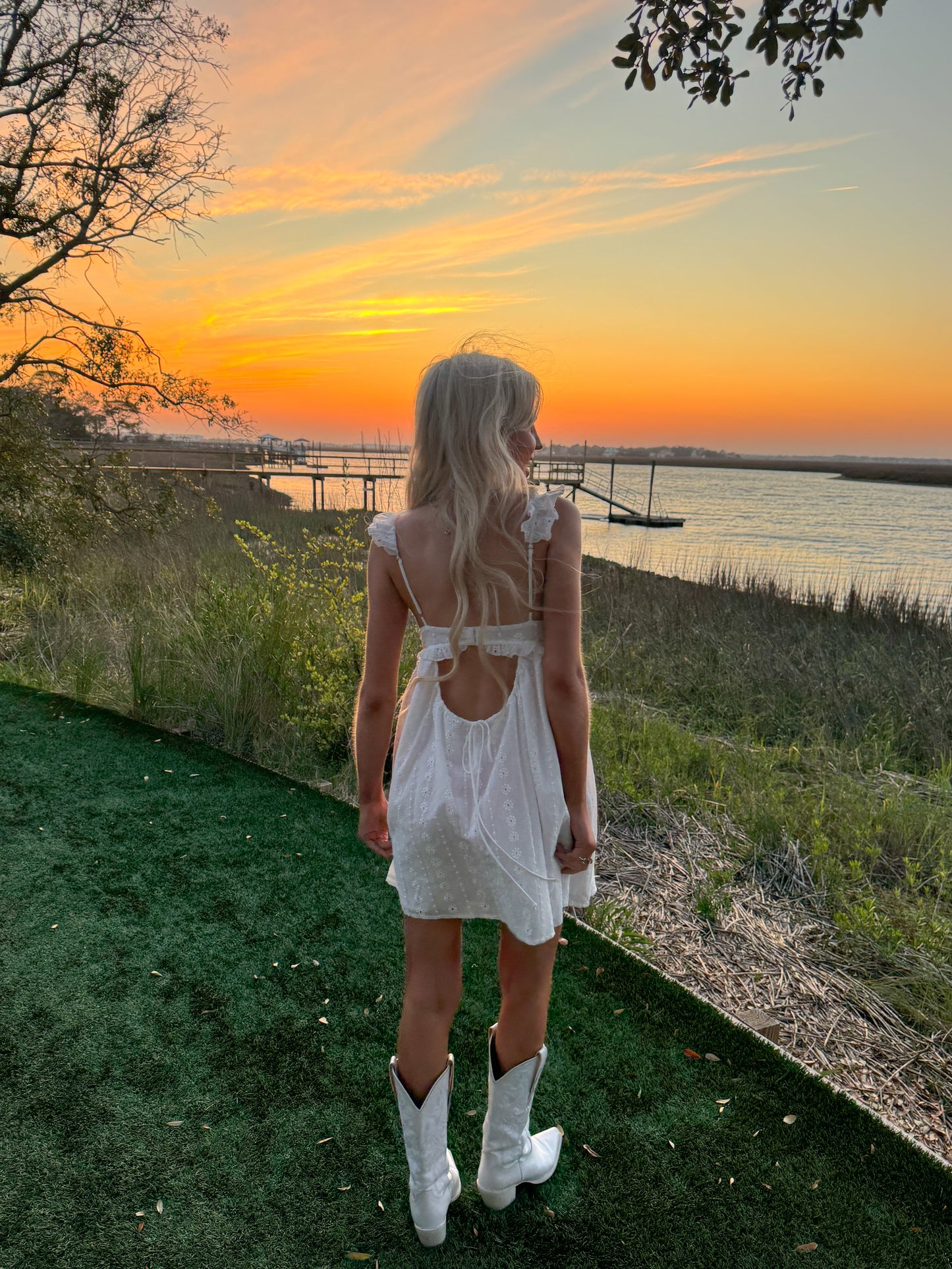 Sassy Shortcake mini dress with adjustable straps and bow accent