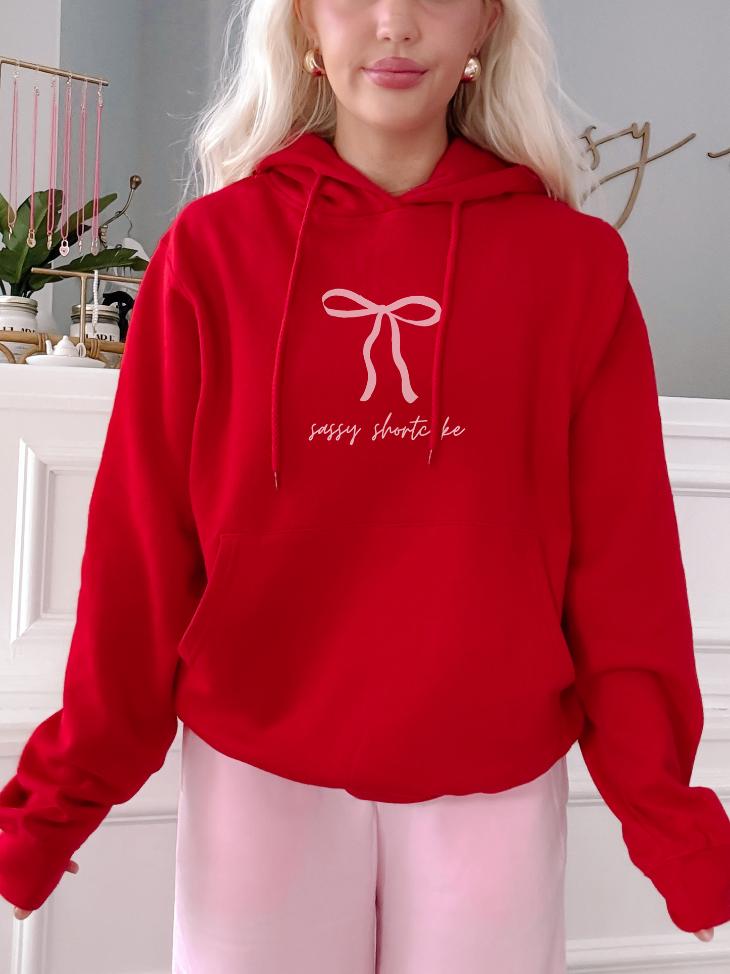 Red Sassy Shortcake hoodie with pink bow graphic