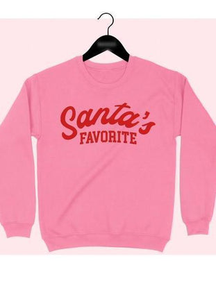 Pink Christmas sweatshirt with red "Santa's Favorite" graphic.