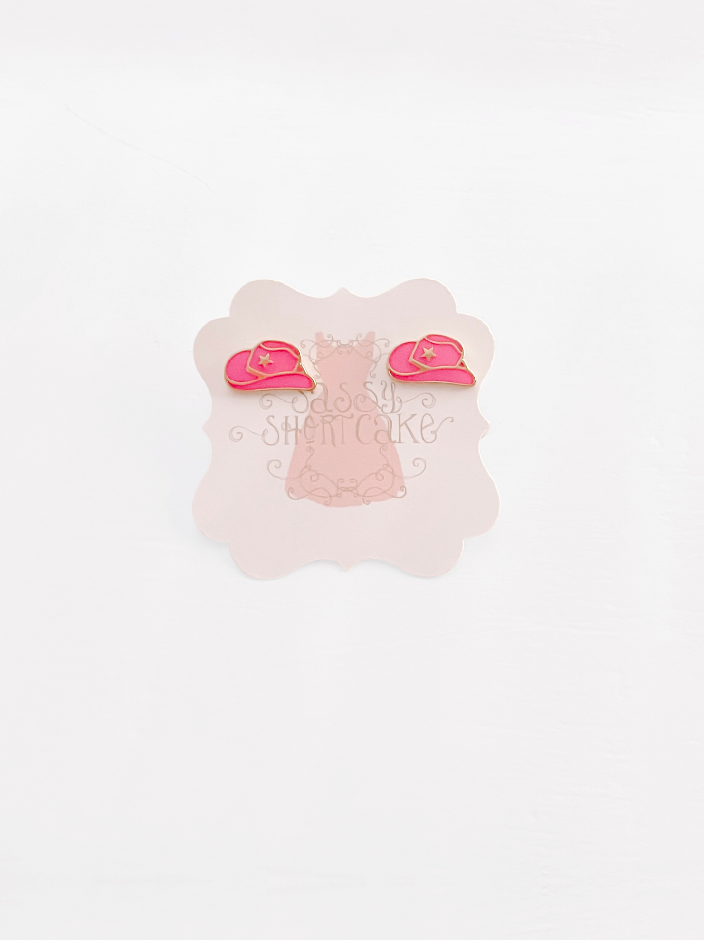 Pink Cowgirl hat stud earrings; gold accents