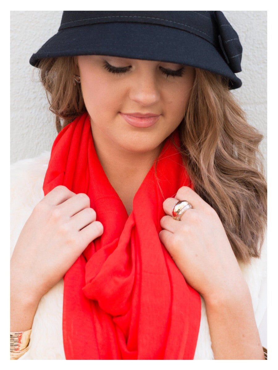 Red infinity scarf, soft & versatile for everyday wear.
