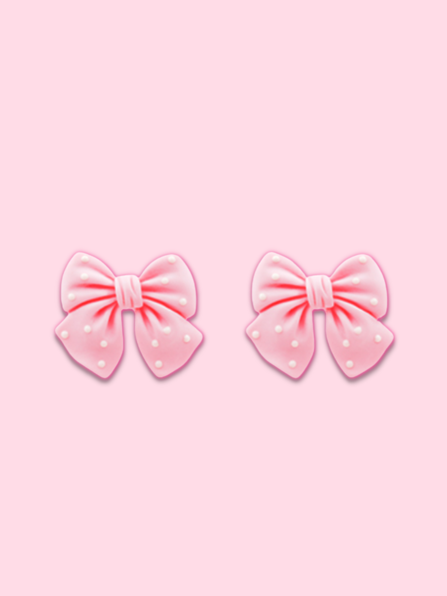 Polka Pink Bow earrings: Pink bow-shaped earrings with white polka dots.