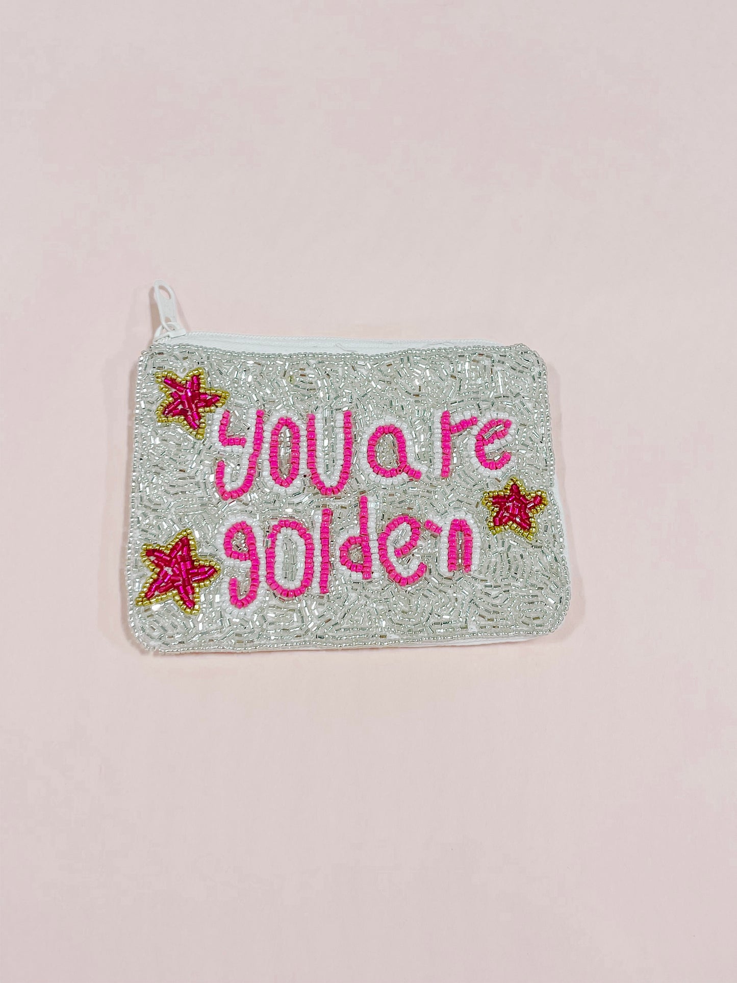 Silver beaded pouch with "You Are Golden" in pink lettering, featuring star accents.