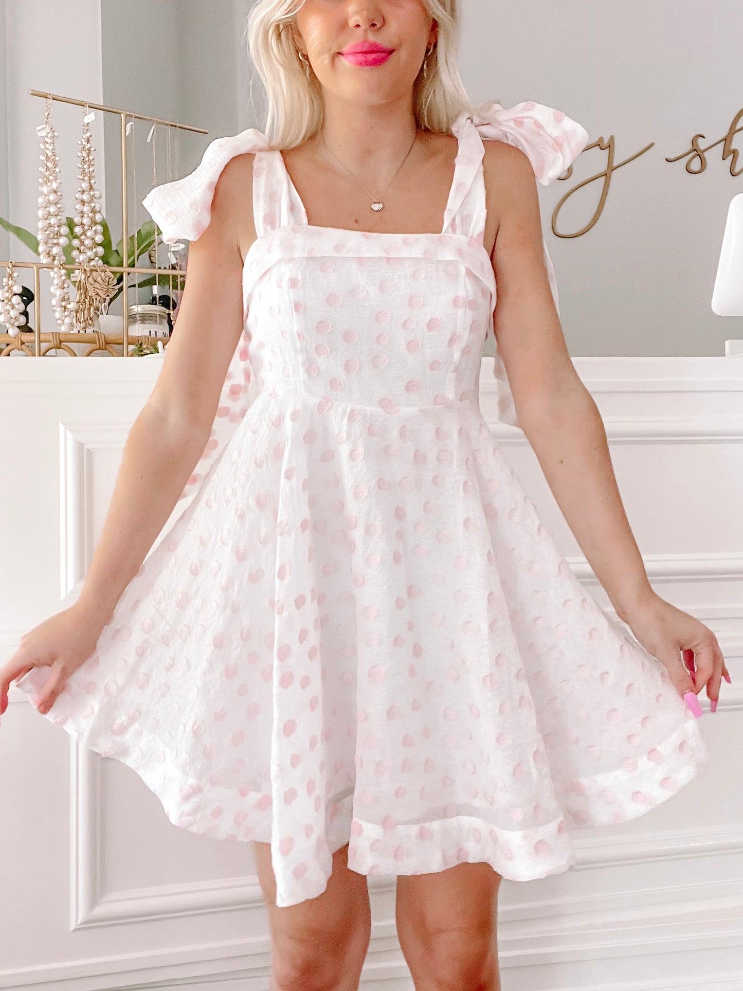 Girls Who Twirl pink polka dot dress with bow shoulder straps