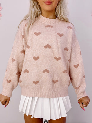Pink fuzzy heart sweater; adorable, soft knit.