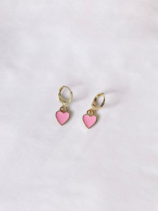 Pastel Love Earrings: Gold hoop earrings with pink heart charms.