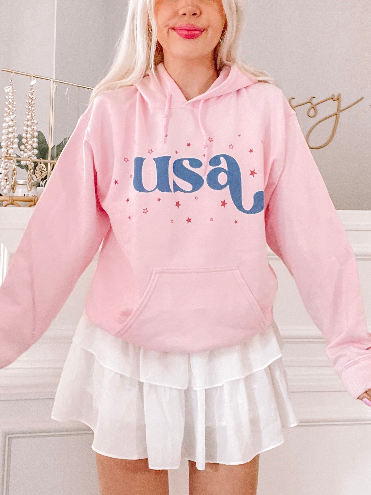 Pink USA Sparkle Hoodie: Cute pink hoodie featuring "USA" graphic & stars. Perfect for showing your patriotic style!