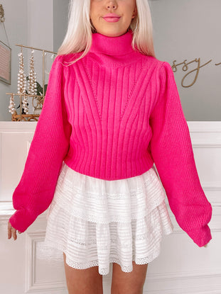 Playdate Pink Sweater: Hot pink ribbed knit turtleneck sweater with balloon sleeves.