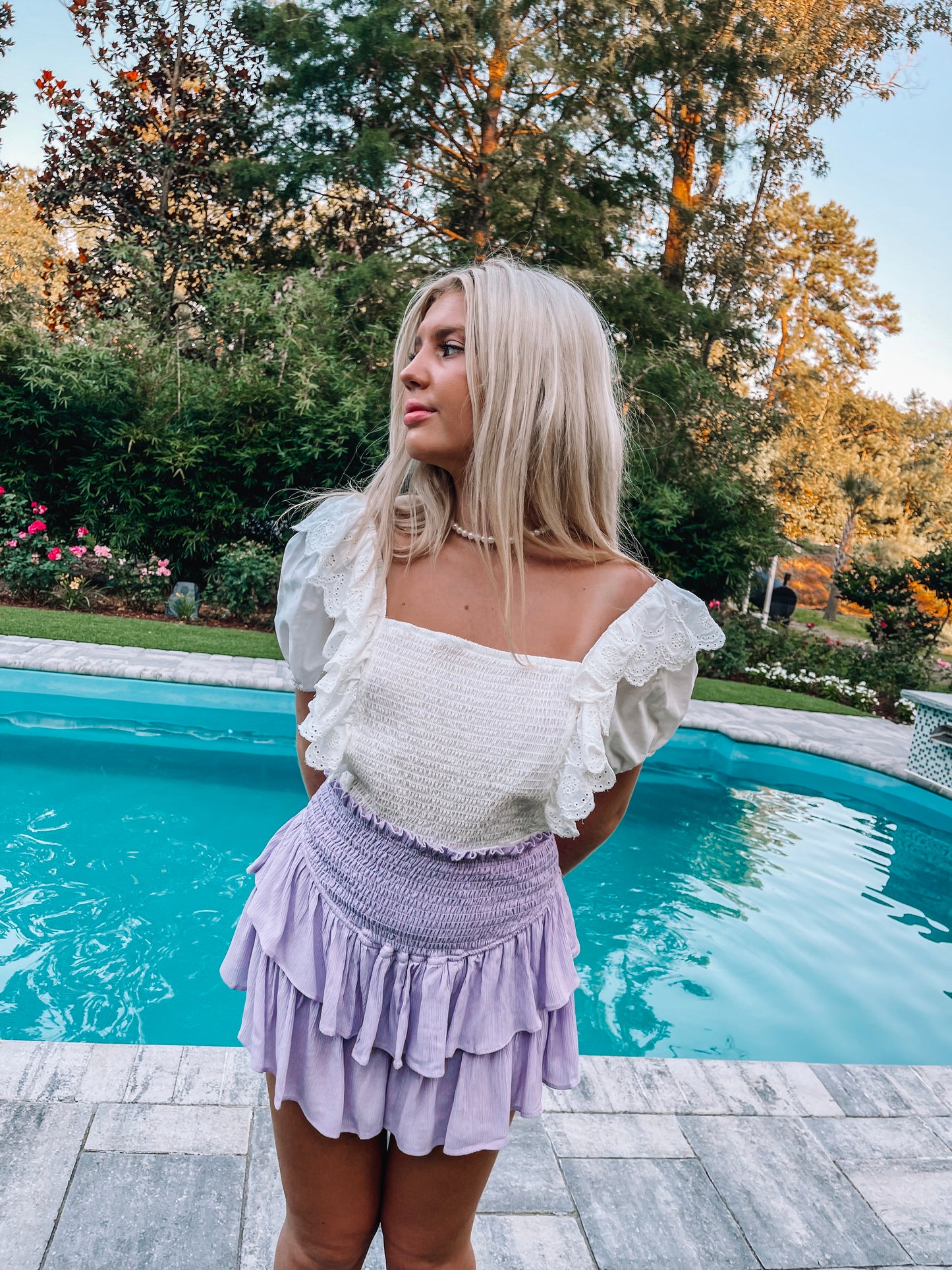 Layered lavender skirt by the pool, summer fashion