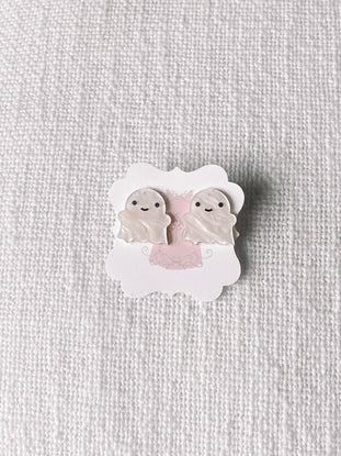 Adorable ghost-shaped Halloween earrings displayed on a card