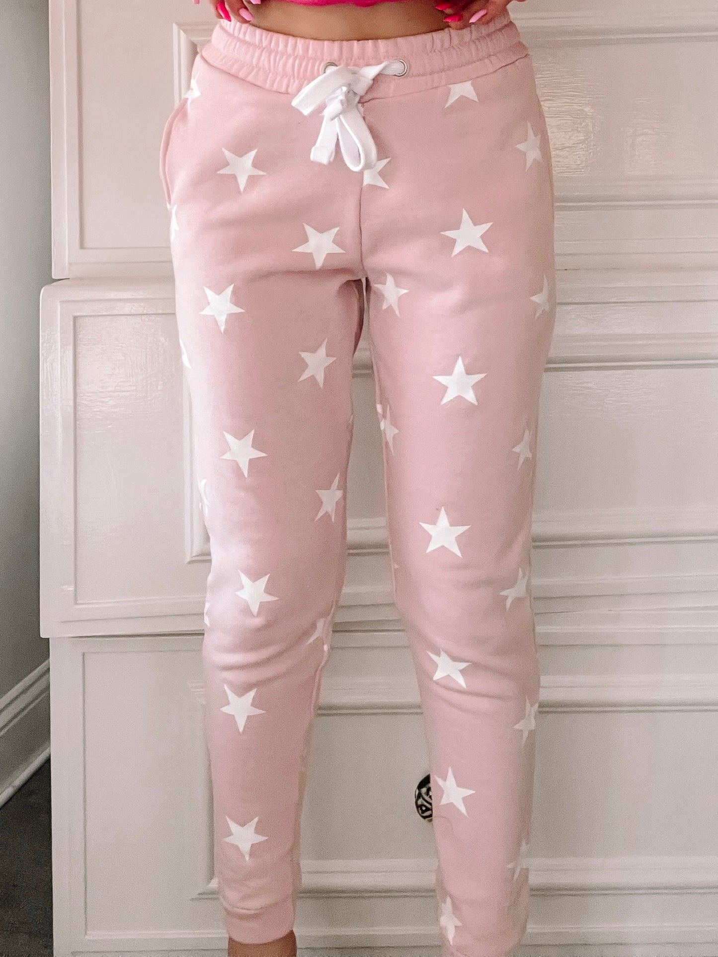 Pink Stargazer joggers with white star print