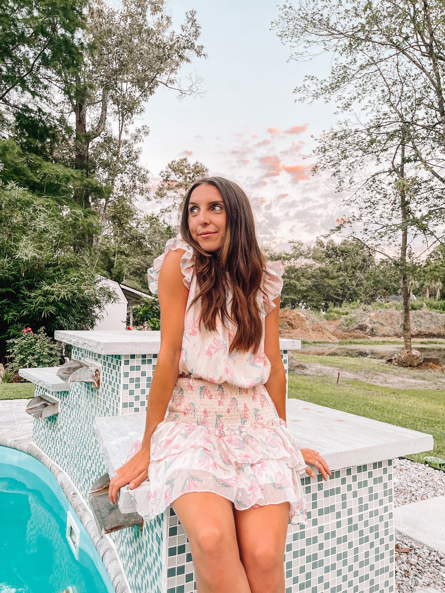 Floral Making Moves Dress: Lightweight, ruffled mini dress in a pretty pink and white print, perfect for summer.