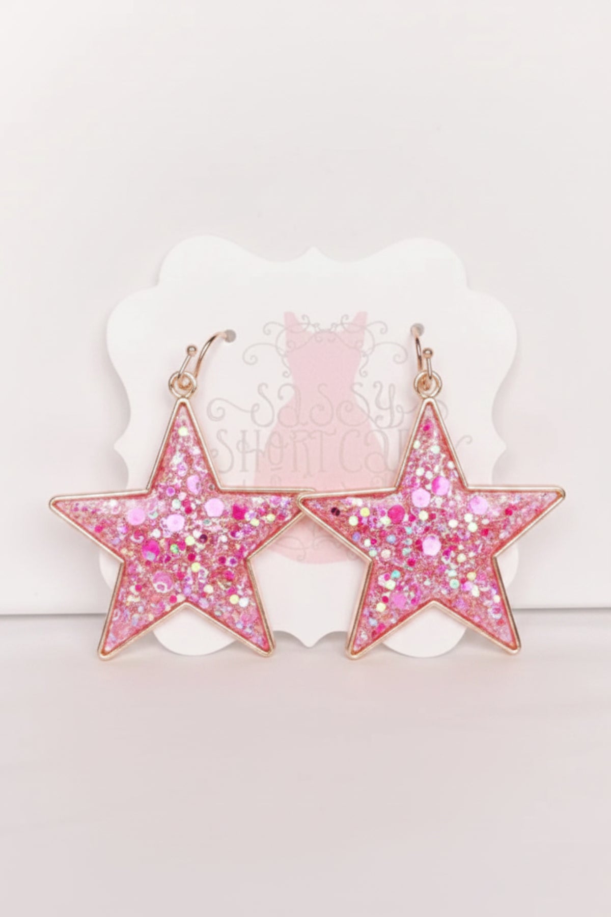 Pink glitter star earrings with gold accents; Chasing Stars from Sassy Shortcake