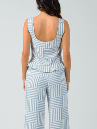 Blue and white striped peplum top and wide-leg pants.