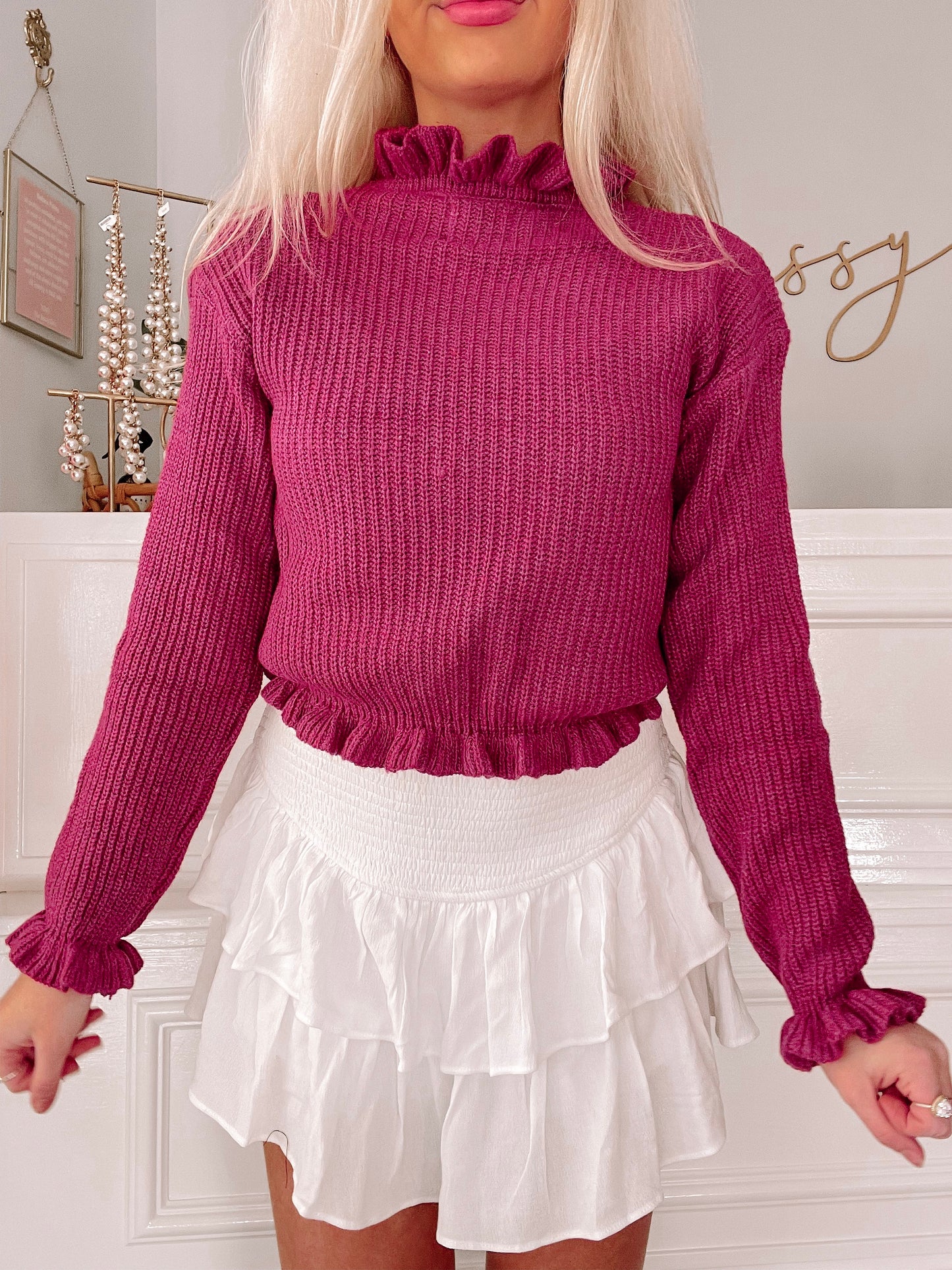Crimson ribbed Avaline sweater with ruffled neckline and cuffs