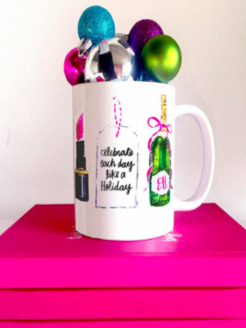 Celebrate Each Day Like a Holiday mug, featuring lipstick, champagne, & festive ornaments.