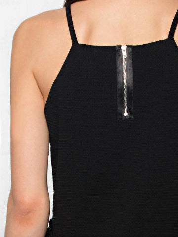Back view of a black sleeveless top featuring a hidden zipper closure.