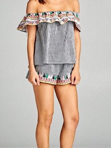 Off-the-shoulder gingham top and shorts set with colorful embroidered trim.