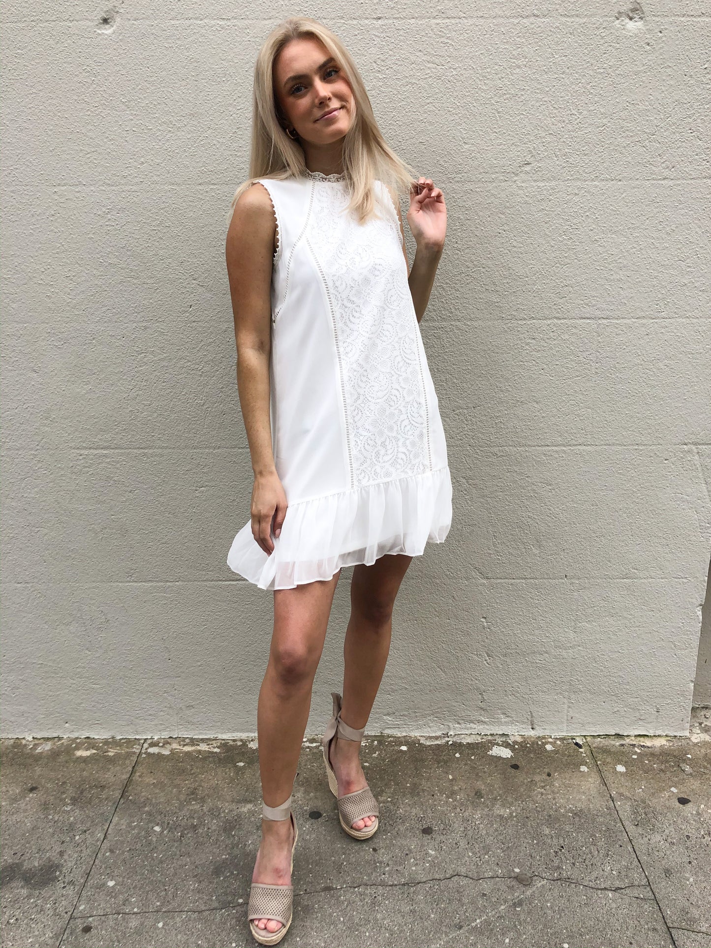 White lace detail shift dress, ruffle hem, perfect for summer.