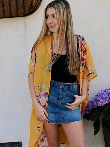 Mustard yellow floral print kimono, lightweight chiffon fabric, featuring a high-low hemline.