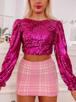 Fuchsia sequin Eliana top with long sleeves, perfect for parties.