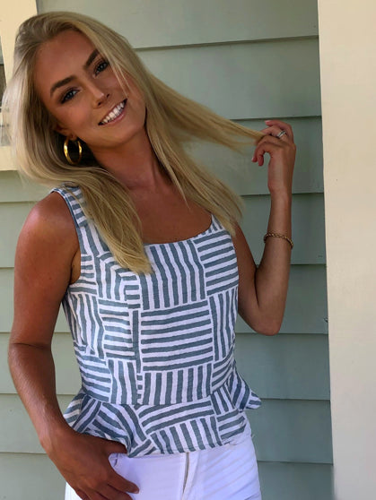 Sullivan Peplum Top: Blue and white striped linen sleeveless top with peplum detail.