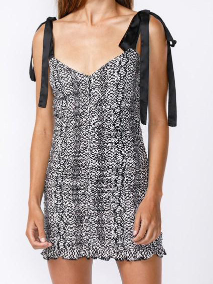 Black and white snakeskin print mini dress with black satin ribbon straps.