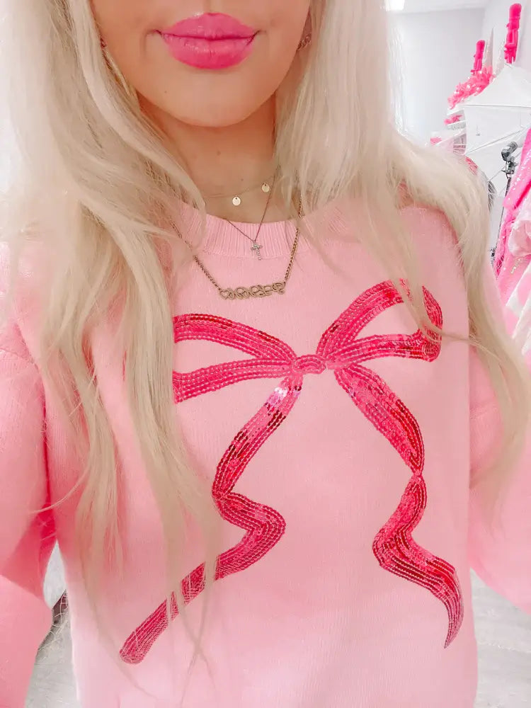 Preppy women’s tops collection from Sassy Shortcake — cute sweaters, blouses, and bow-detailed tops in pink